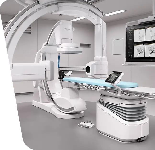 Imaginea ilustrează un aparat medical angiograf, esențial în desfășurarea procedurii de arteriografie. Descoperiți mai multe despre această investigație și rolul crucial al aparatului în diagnosticarea și evaluarea afecțiunilor vasculare în articolul nostru specializat.