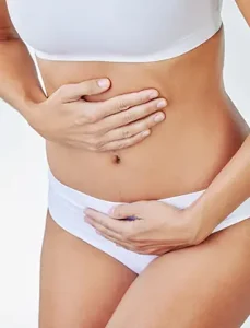Chirurgie Vasculară 9 Poza ilustreaza silueta unei femei care are dureri abdominale. Poza reprezentativa pentru embolizarea varicelor pelvine