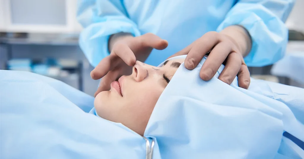 Featured image representative for the ENT surgery page of the VenArt clinic in Transilvania, Cluj-Napoca, Romania. The image shows a woman on the operating table during a nose procedure.